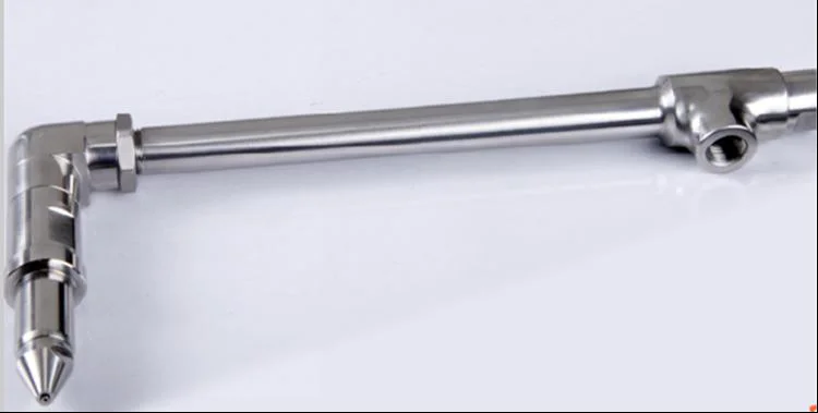 Bottom spray gun assembly for fluid bed coating chamber