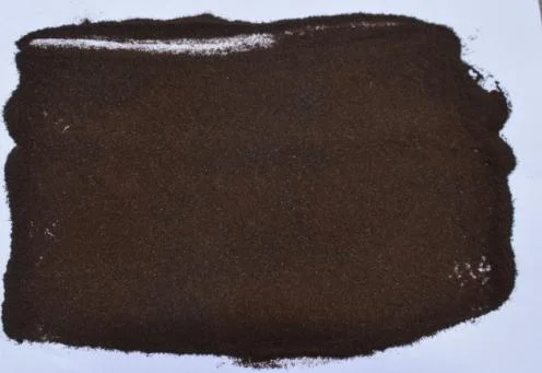 Granulator open lid showing rotor milling wet granules