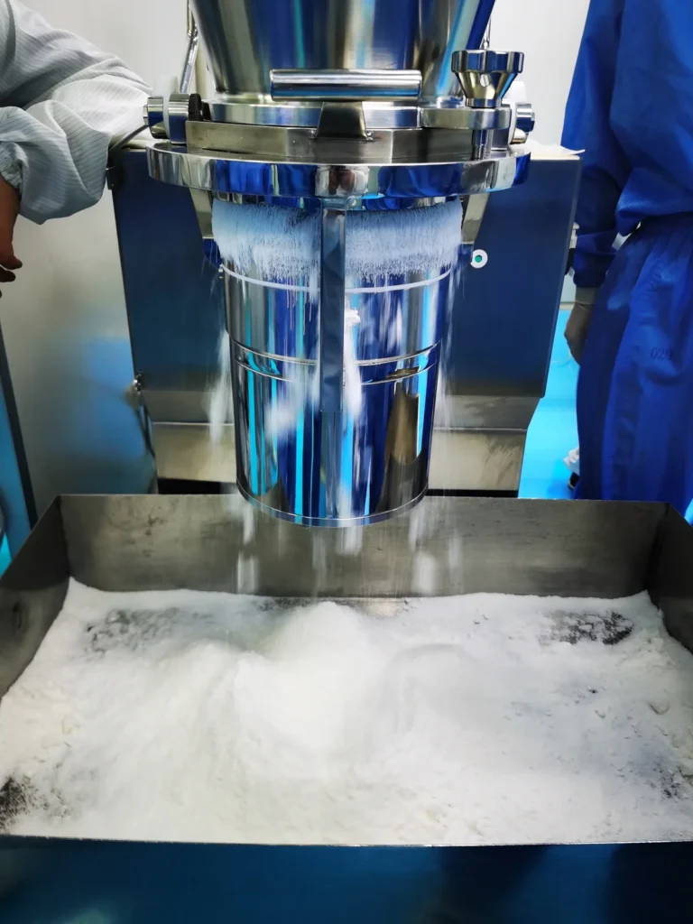 Wet extrudate discharge from spinning extruder screen