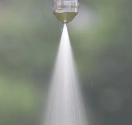 Atomization spray cone of binder addition nozzle